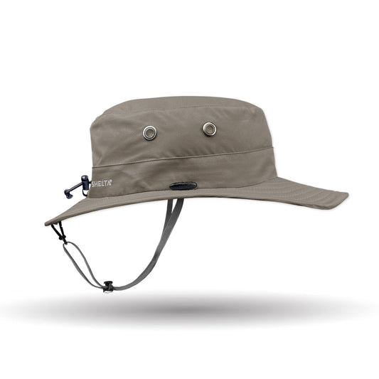 Brown bucket hat with chin strap on a white background