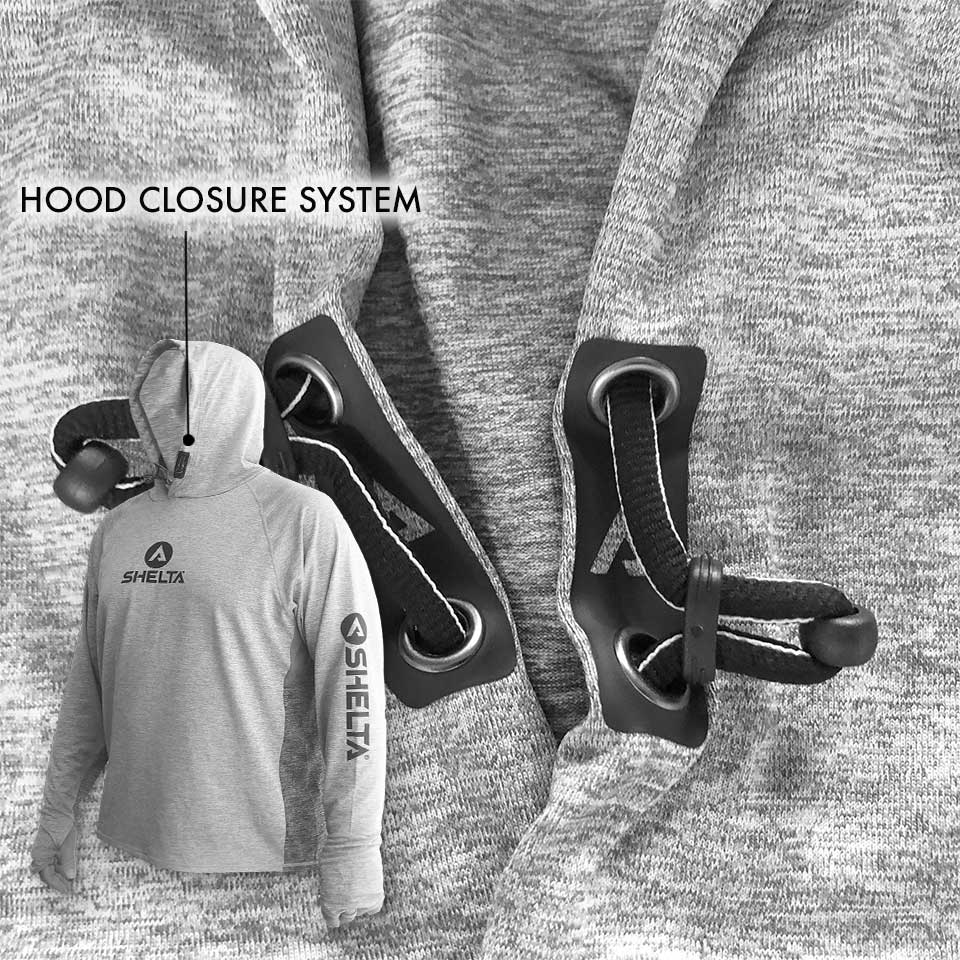 Gray hoodie with hood closure system and Shelta logo on a textured gray background