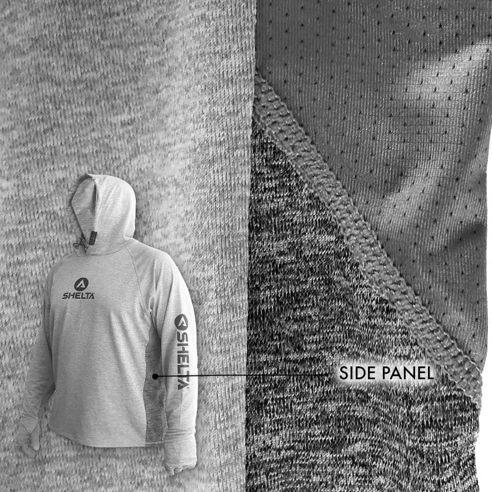 Person wearing a gray hoodie with Shelta logo, showing side panel texture.