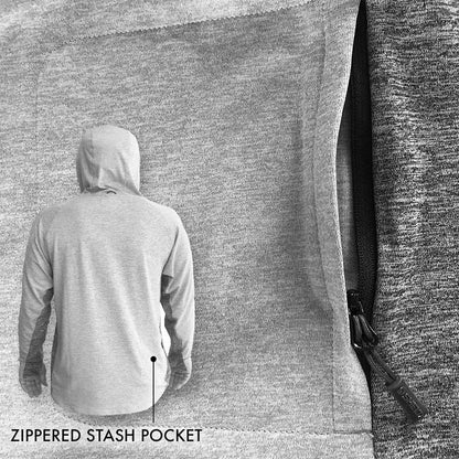 Person wearing a hoodie with a zipped stash pocket on a textured fabric background