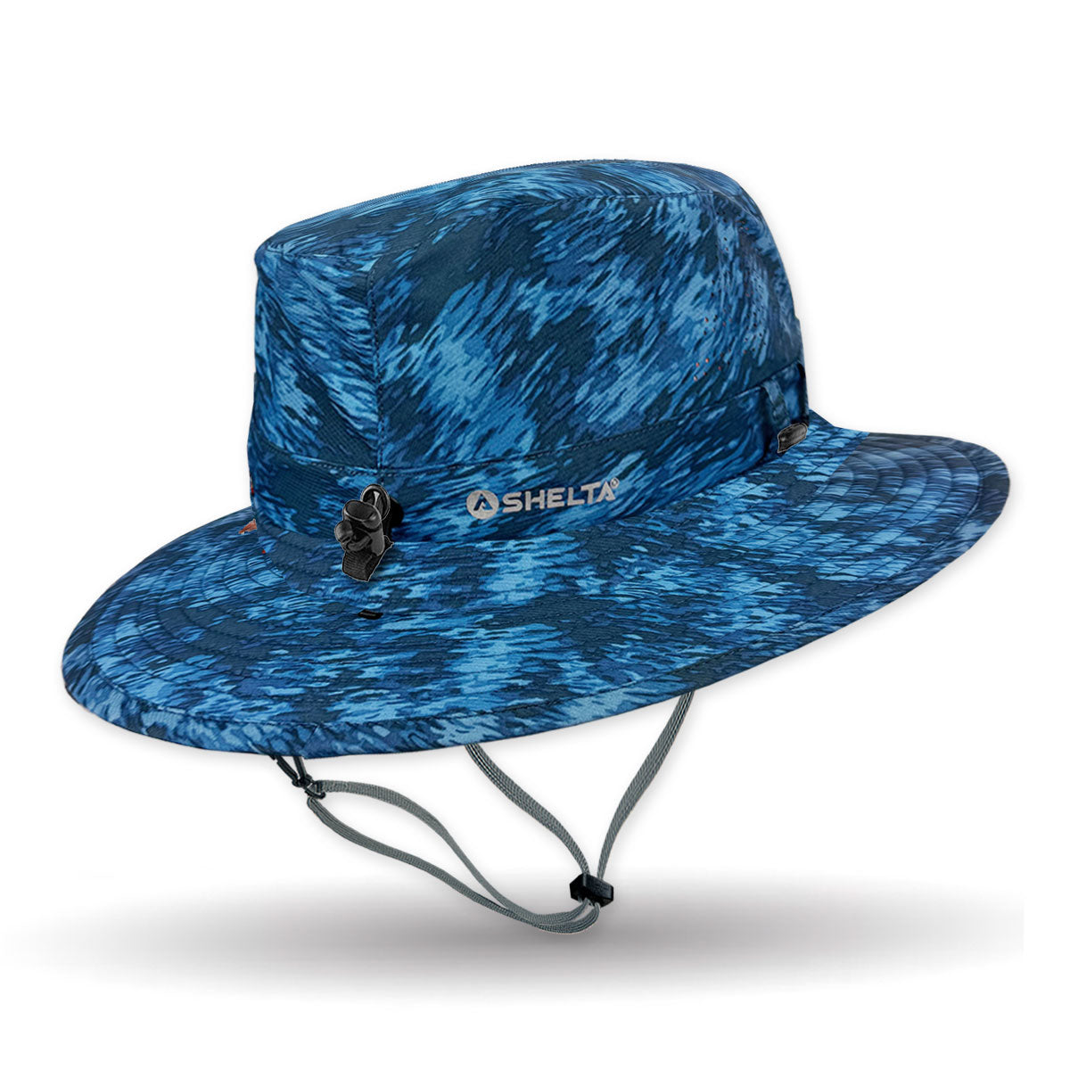 Blue camouflage patterned sun hat with 'Shelta' branding on a white background