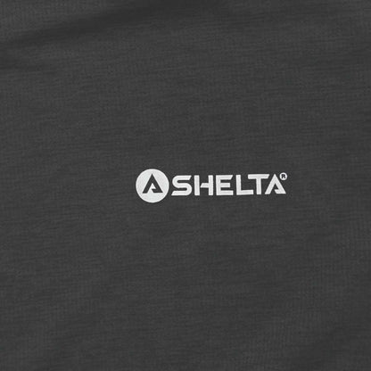 SHELTa logo on a dark gray background