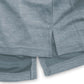 Close-up of blue shorts with a textured pattern on a white background