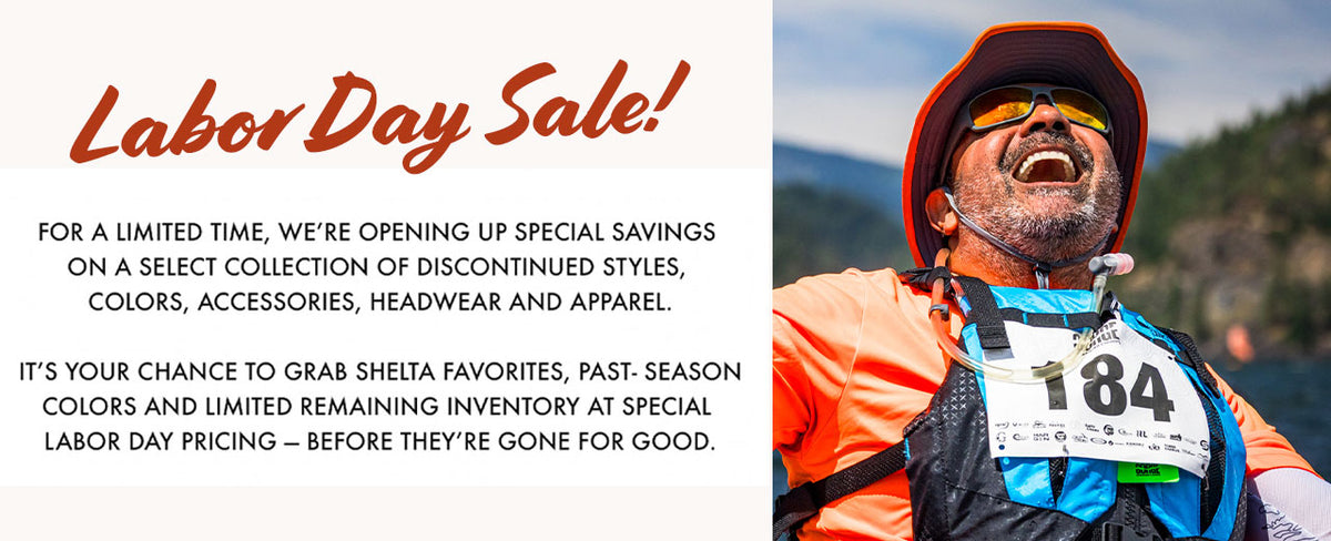 Promotional banner for a Labor Day sale featuring a man in an orange shirt and cap running with a race bib, next to text offering special savings on discontinued styles, colors, accessories, headwear, and apparel.