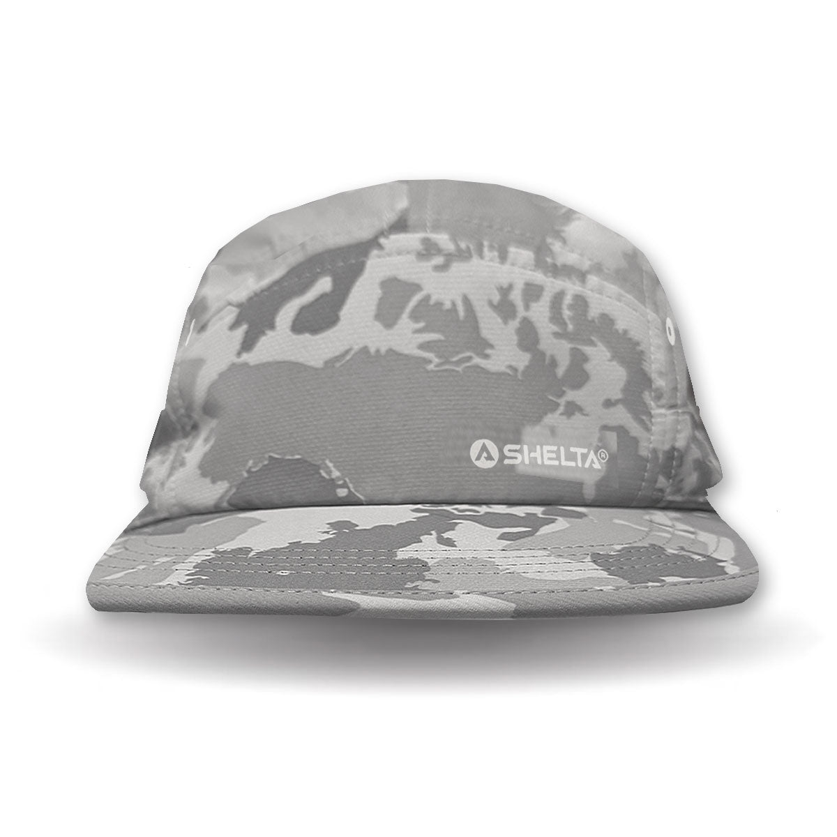 Camouflage-patterned cap with 'SHELTA' logo on a white background