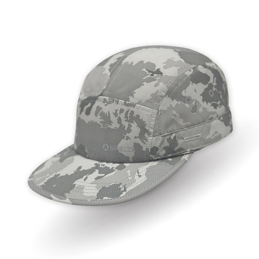 Camouflage-patterned cap on a white background