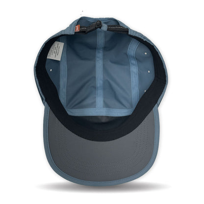 Back view of a blue cap with a white background