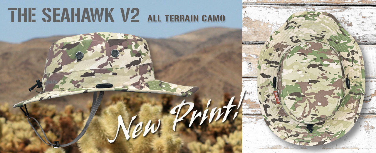 Camouflage hat with 'New Print' text on a desert background