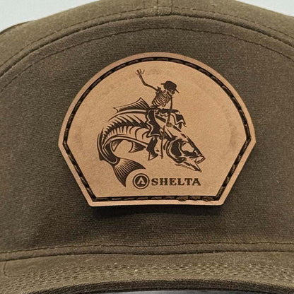 The Shelta Fish Wrangler Cap In Rust logo