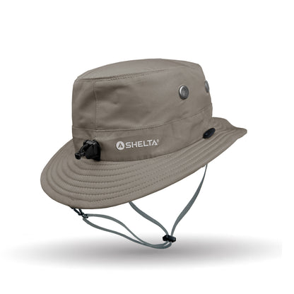 Beige bucket hat with Shelta logo on a white background