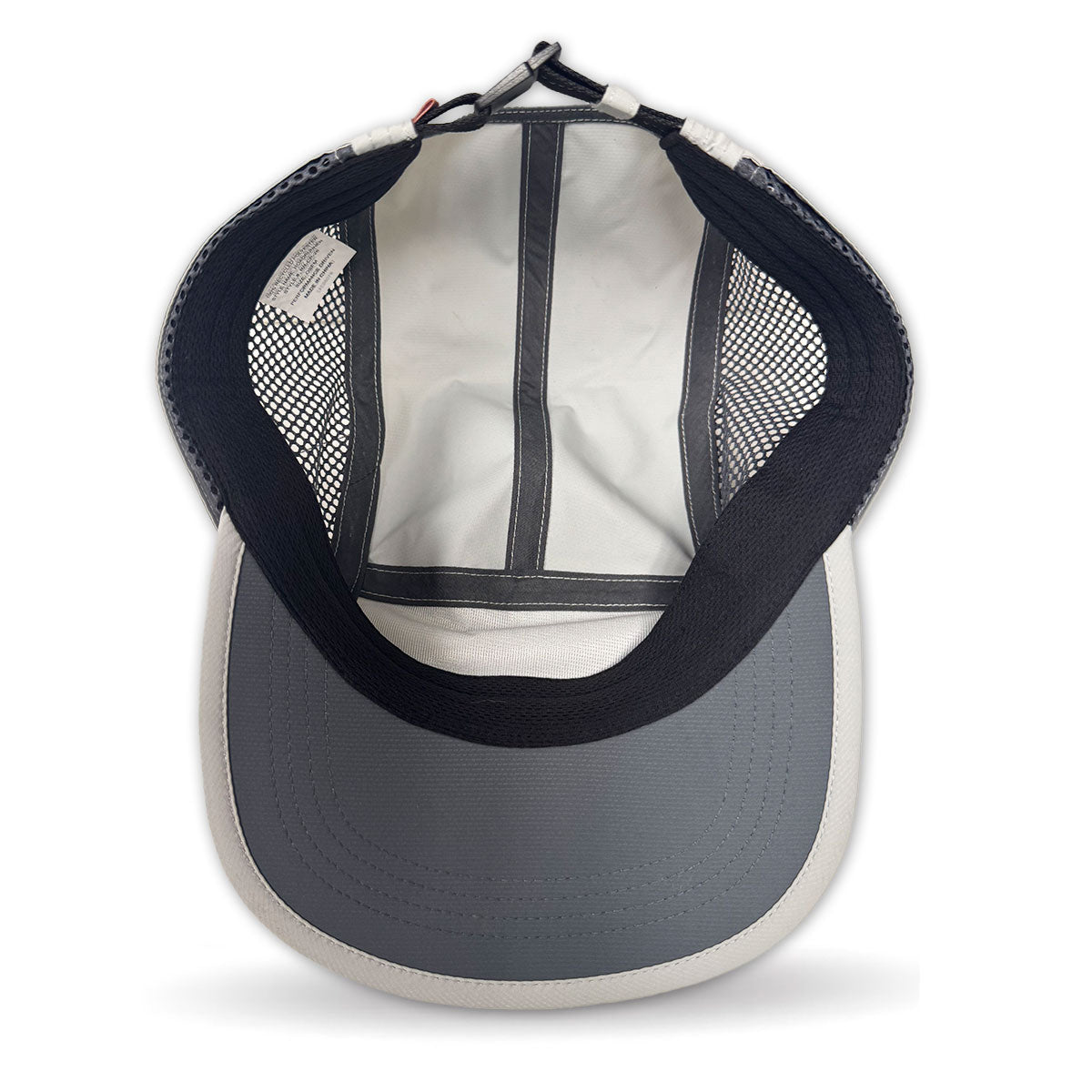 Back view of a cap with mesh design on a white background