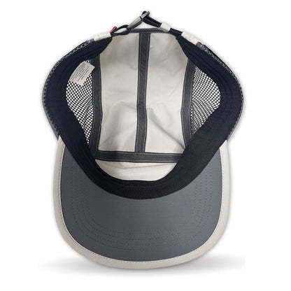 Back view of a cap with mesh design on a white background