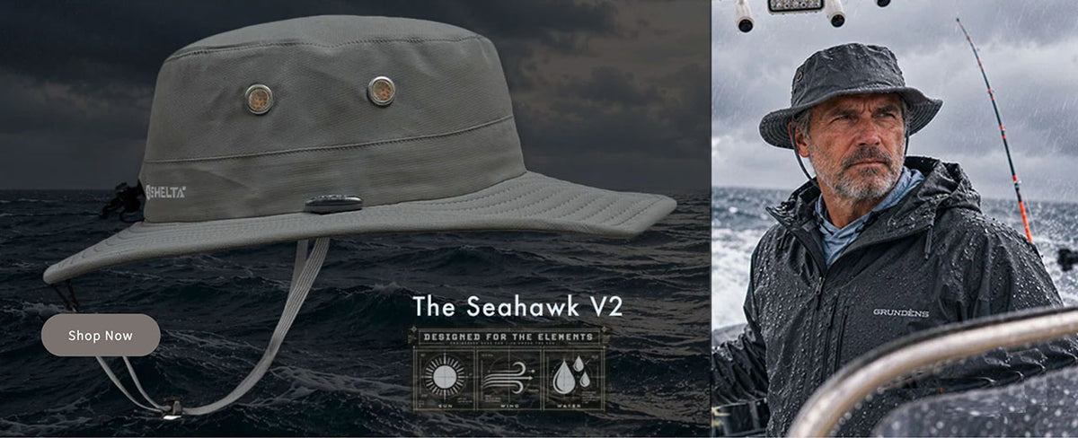 man wearing a seahawk on a boat in the rain