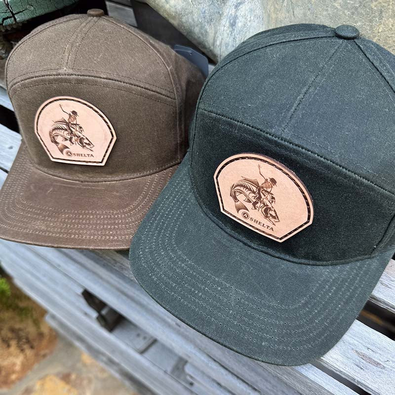 The Shelta Fish Wrangler Cap In Rust and charchoal