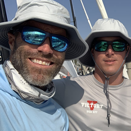 Two Sailors wearing the Condor Sun Hat