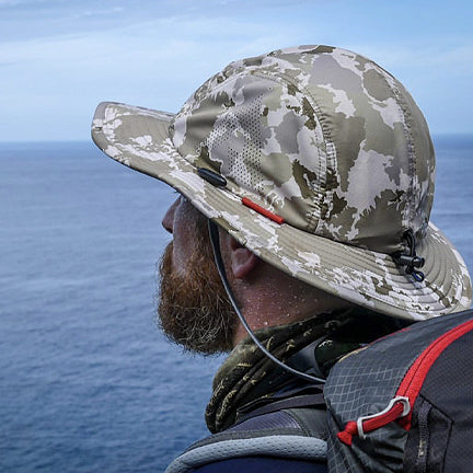 Hiker wearing the Raptor sun hat