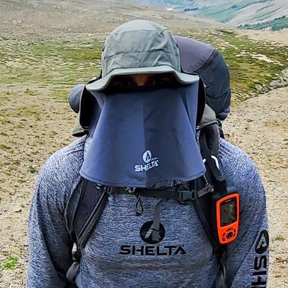 Hiker wearing neck shield in front