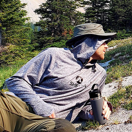 Picture of Man relaxing wearing Shelta Hat and Sun Shirt